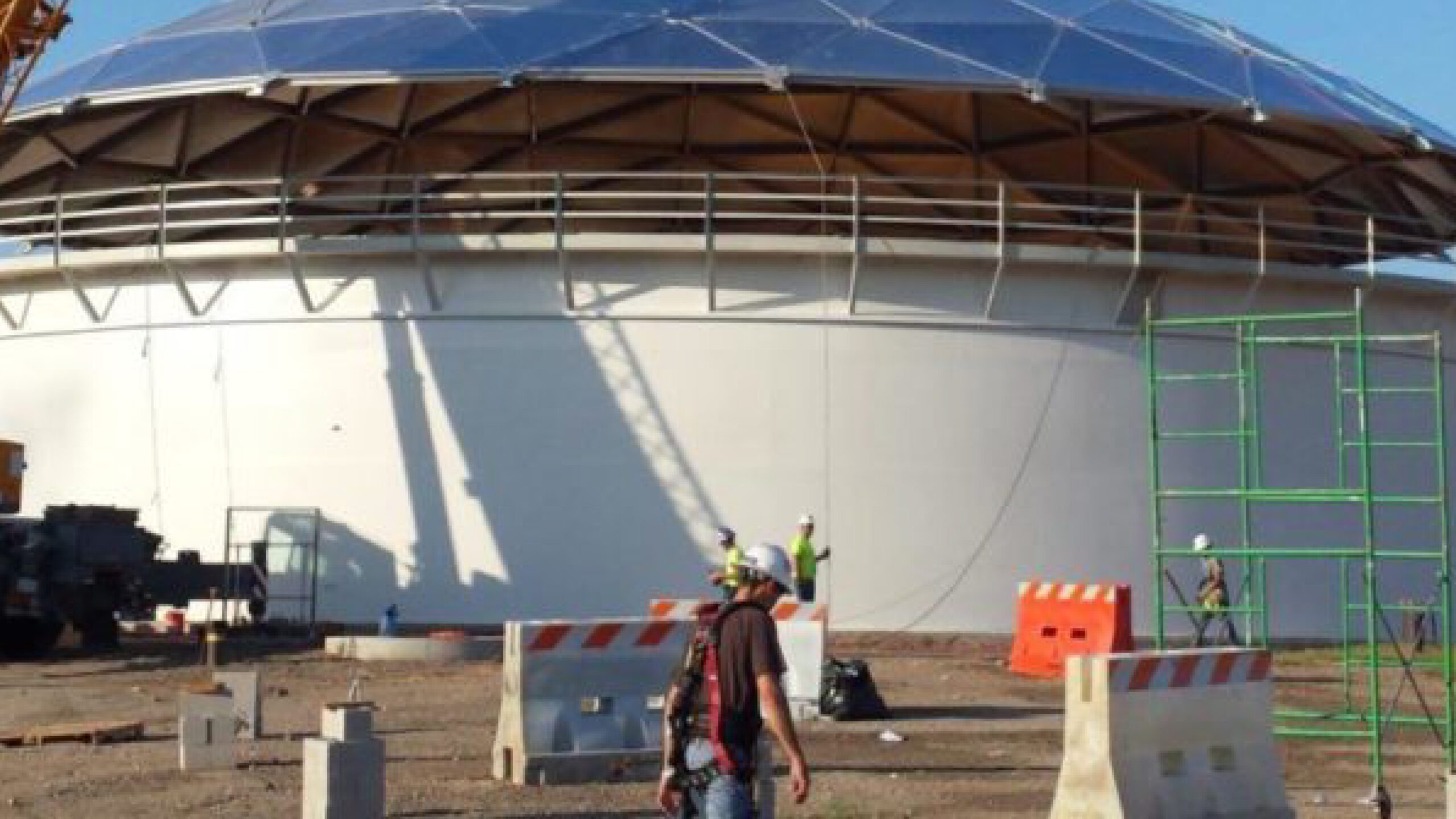 Workers working on a new tank